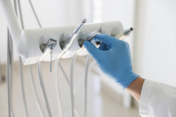 Professional Tooth Extraction technician working in Calera, OK